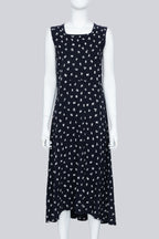 COMME DES GARCONS - A NAVY DRESS WITH A WHITE FLORAL PATTERN