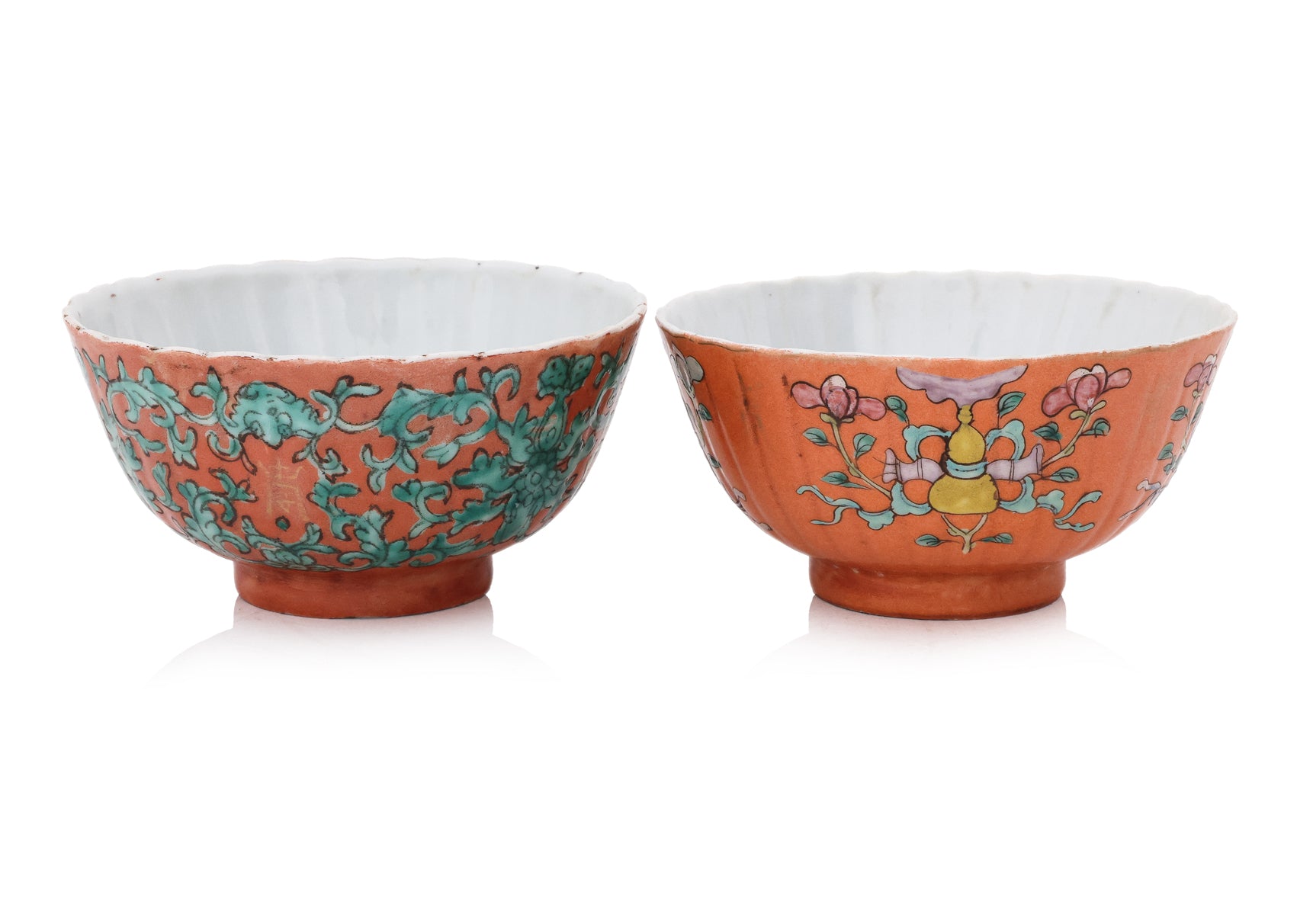 TWO FAMILLE ROSE CORAL GROUND 'SHOU' BOWLS
