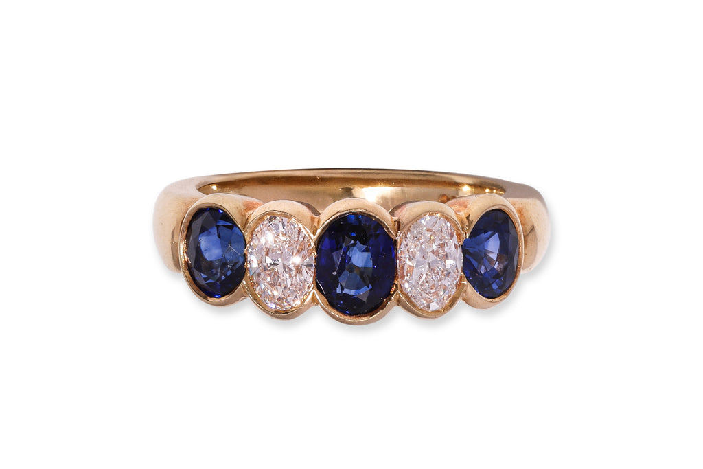 A SAPPHIRE AND DIAMOND FIVE STONE RING