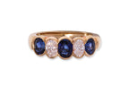 A SAPPHIRE AND DIAMOND FIVE STONE RING