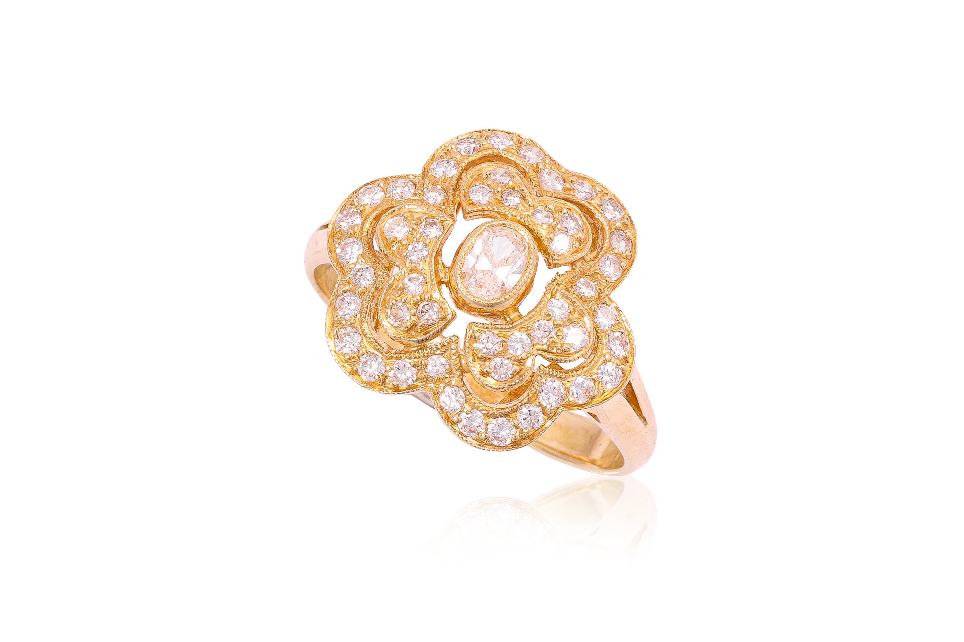 A HIGH KARAT GOLD DIAMOND 'FLOWER' RING