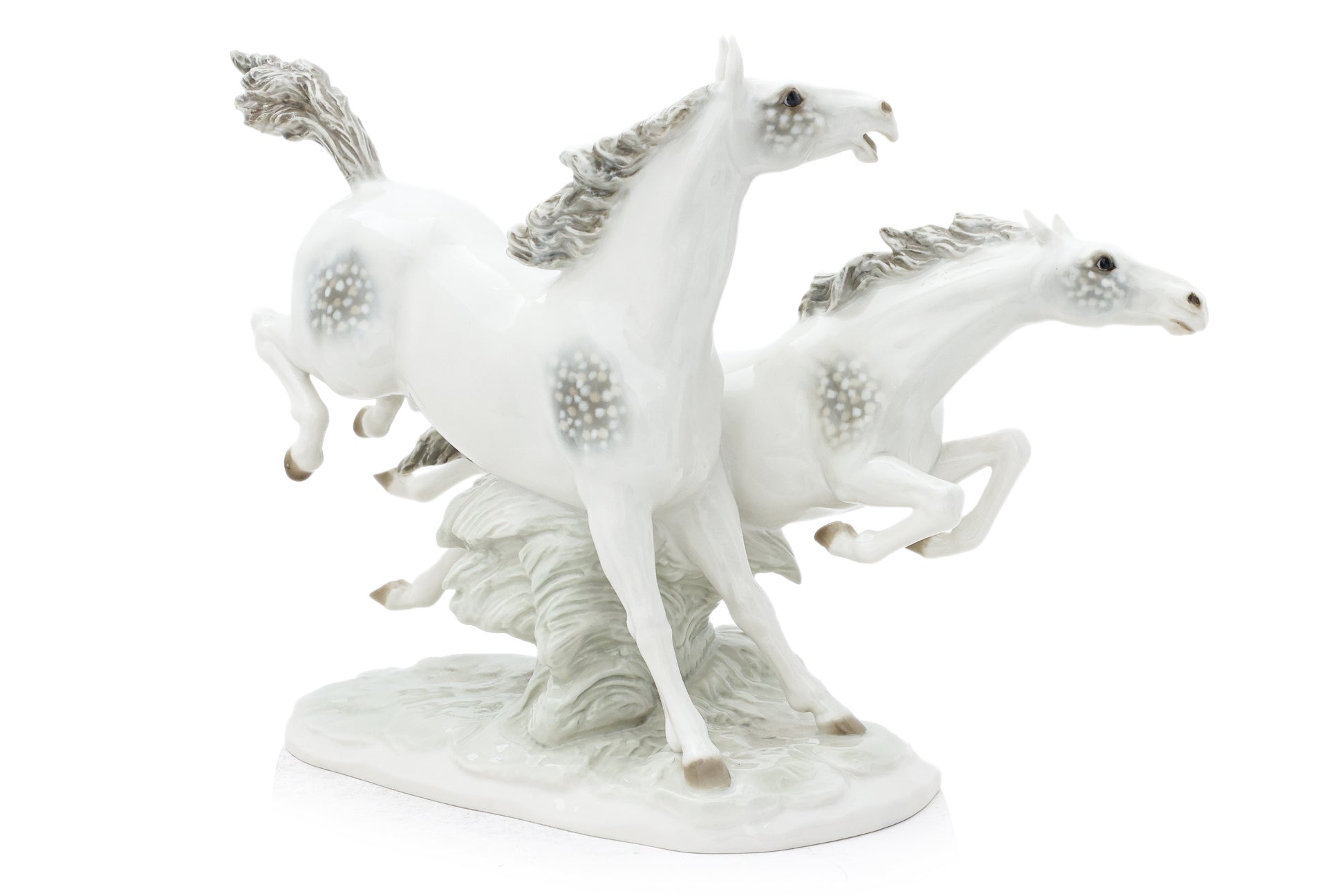 A HUTSCHENREUTHER 'IN FREEDOM' HORSES PORCELAIN GROUP