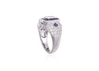 A DIAMOND AND SAPPHIRE RING
