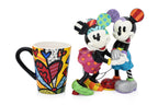 ROMERO BRITTO - A GROUP OF TABLEWARE, A DISNEY FIGURE, AND A PORCELAIN PLAQUE FOR GOEBEL