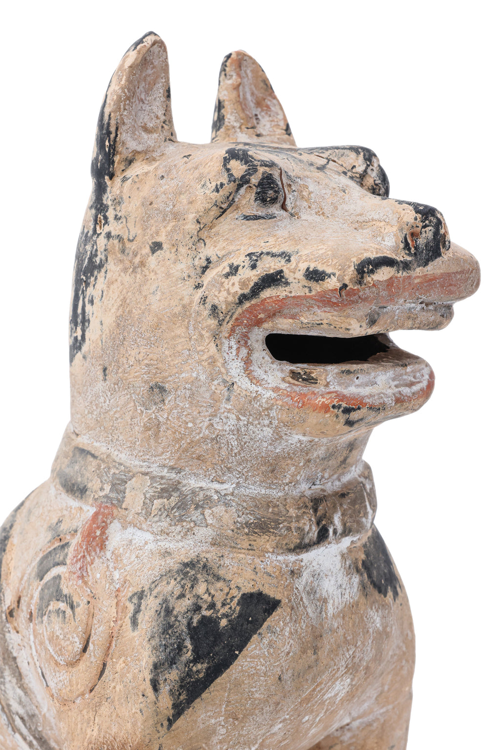 A PAINTED EARTHENWARE POTTERY MODEL OF A DOG