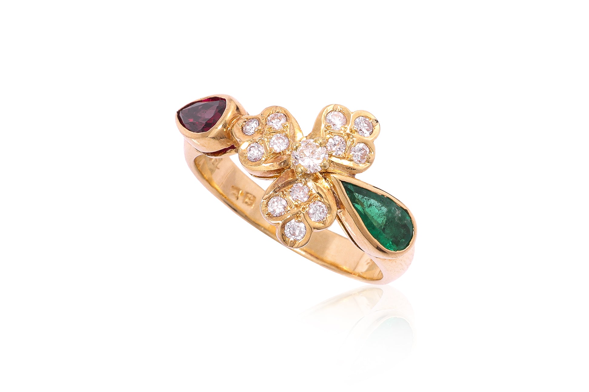 A RUBY, EMERALD AND DIAMOND RING