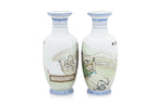 A PAIR OF WINTER SCENE DECORATED PORCELAIN VASES