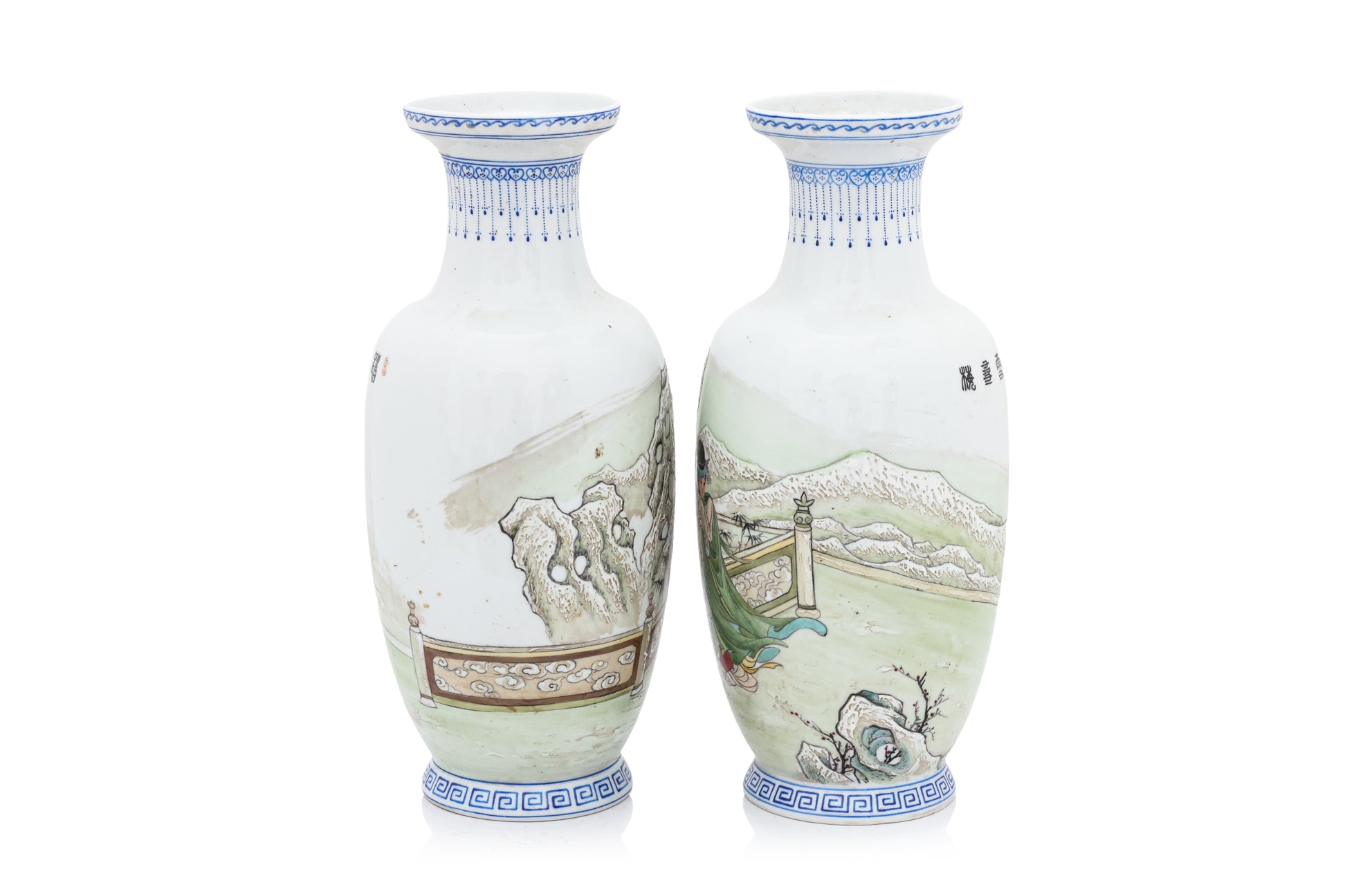 A PAIR OF WINTER SCENE DECORATED PORCELAIN VASES