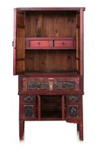 A CHINESE RED LACQUERED AND GILT CABINET