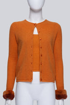 BLUMARINE - AN ORANGE TANK TOP AND CARDIGAN SET