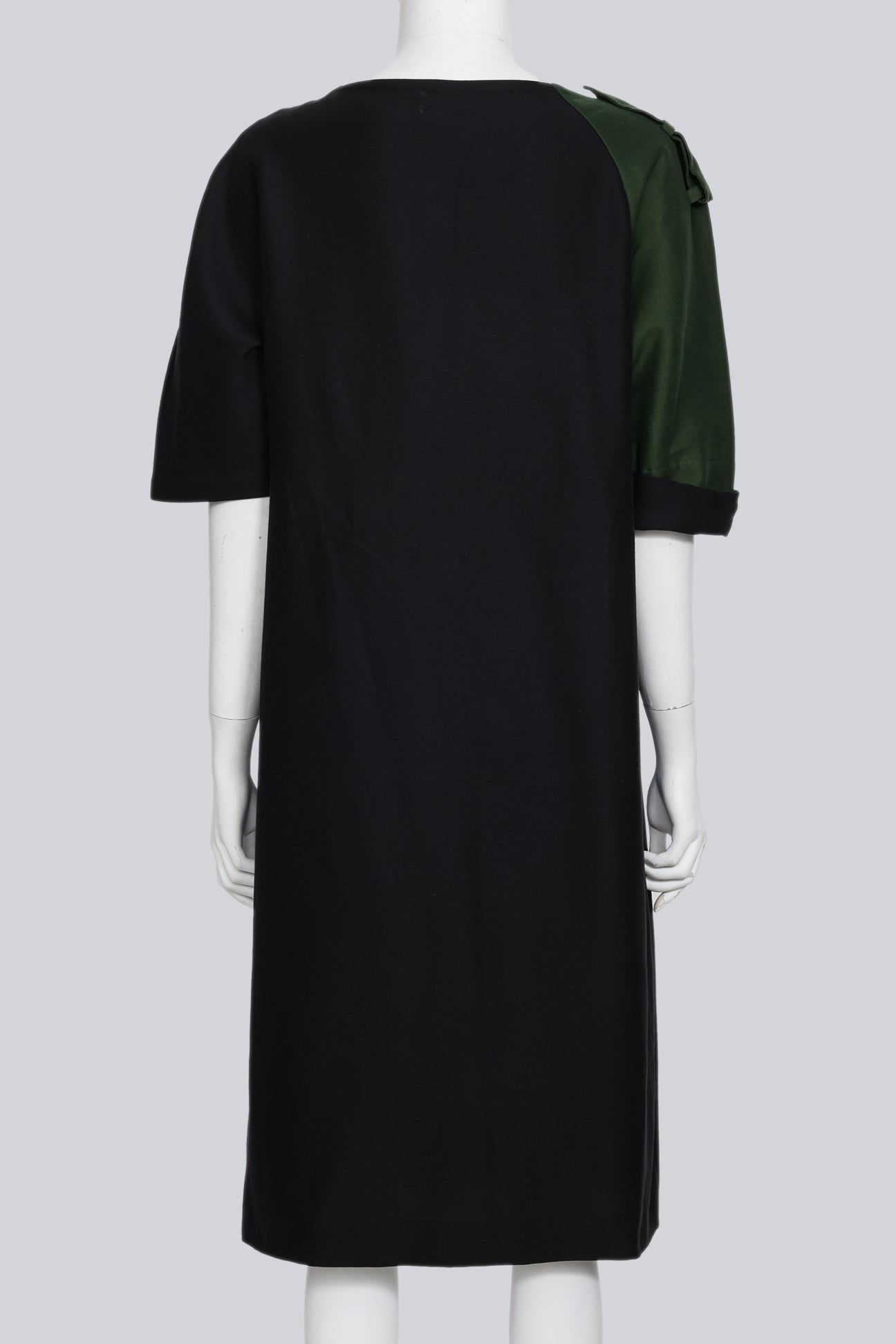 DRIES VAN NOTEN - A BLACK DRESS WITH SINGLE GREEN SLEEVE