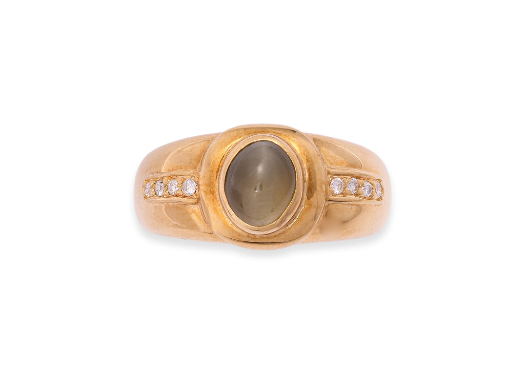 A CAT'S EYE CHRYSOBERYL AND DIAMOND RING