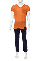 ANN DEMEULEMEESTER - AN ORANGE TOP AND PURPLE TROUSERS ENSEMBLE