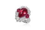 A LEAD GLASS FILLED RUBY AND DIAMOND RING