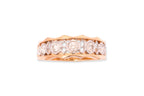 A PIERCED DIAMOND TWO TONE RING