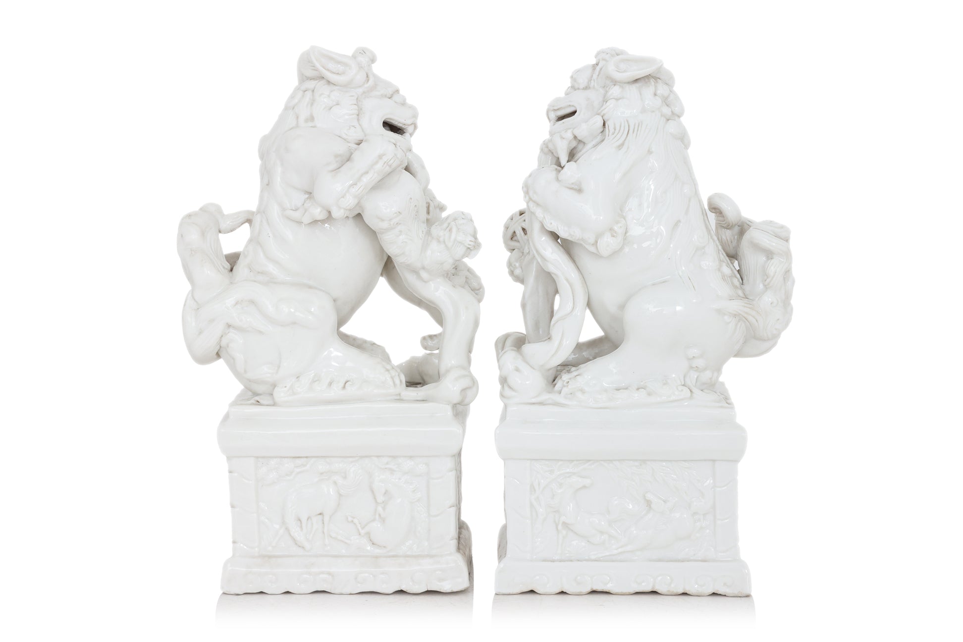 A GROUP OF THREE BLANC DE CHINE PORCELAIN FIGURES