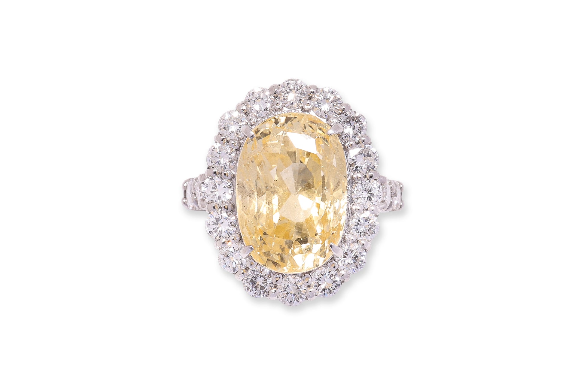 A LARGE UNHEATED YELLOW SAPPHIRE AND DIAMOND RING