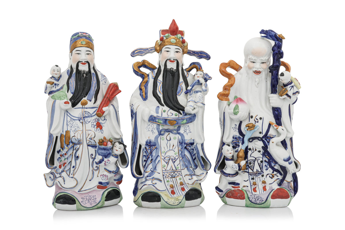 A SET OF THREE CHINESE PORCELAIN FU, LU, SHOU FIGURES