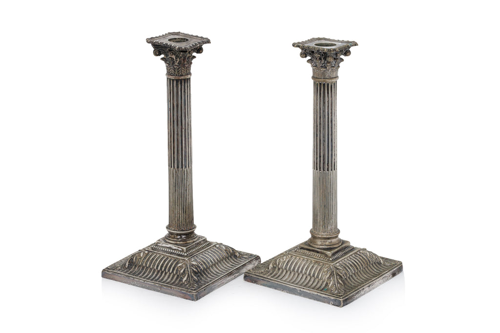 A PAIR OF ENGLISH SILVER PLATED CORINTHIAN COLUMN CANDLESTICKS