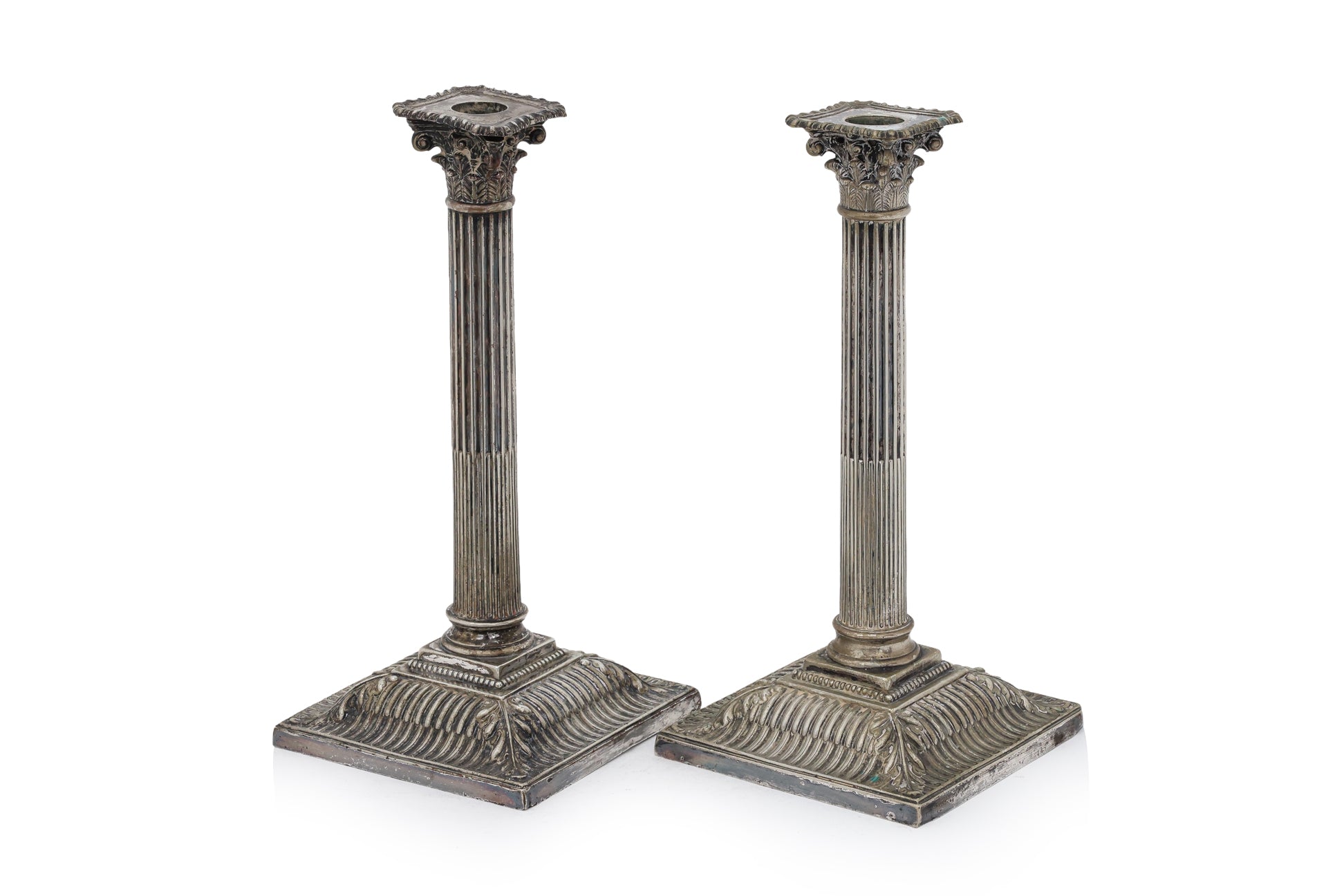 A PAIR OF ENGLISH SILVER PLATED CORINTHIAN COLUMN CANDLESTICKS