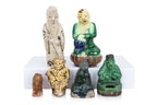 A GROUP OF SIX POTTERY FIGURES