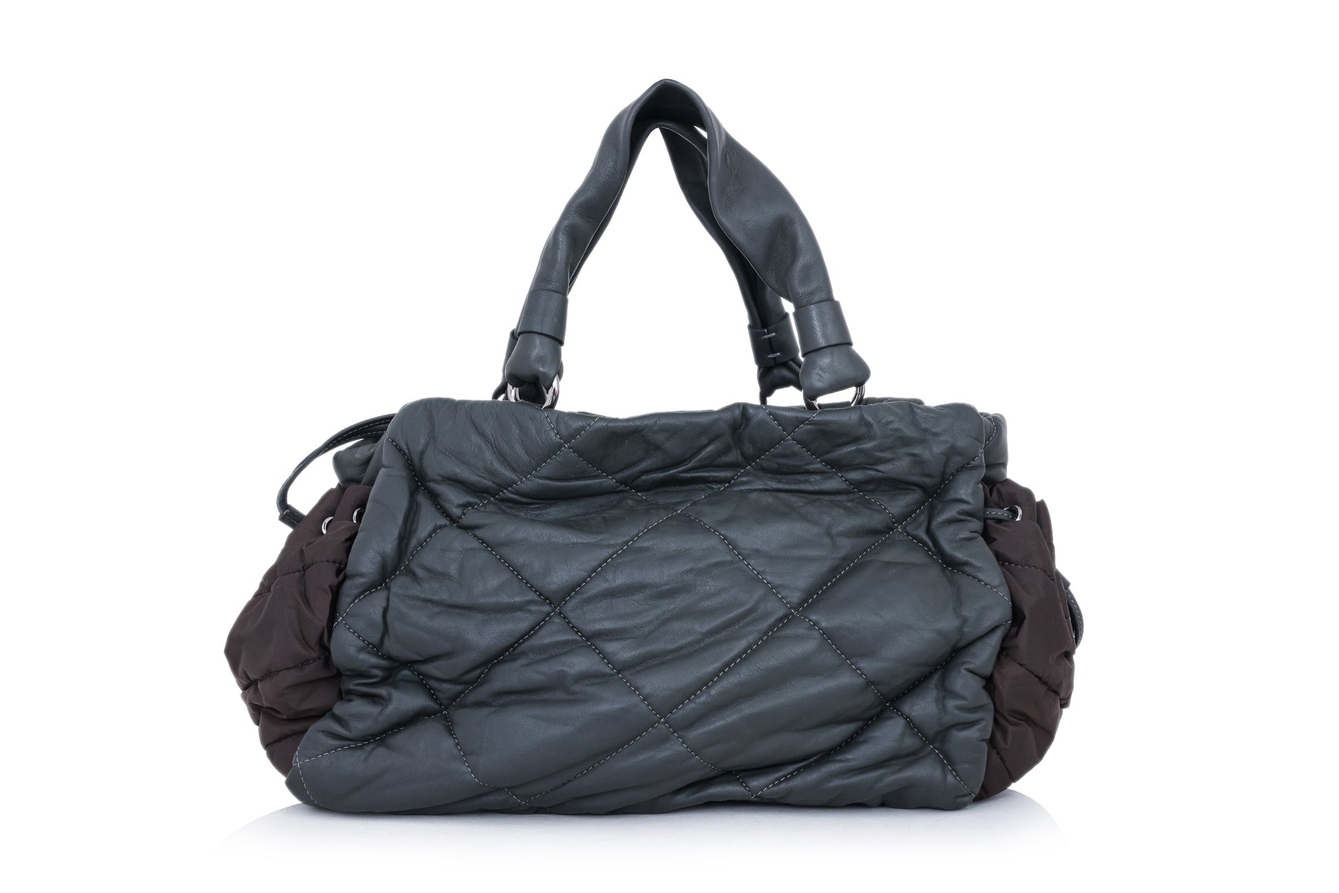 MONCLER - A QUILTED LEATHER BAG