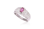 A RUBY AND DIAMOND CLUSTER RING