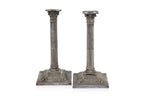 A PAIR OF ENGLISH SILVER PLATED CORINTHIAN COLUMN CANDLESTICKS