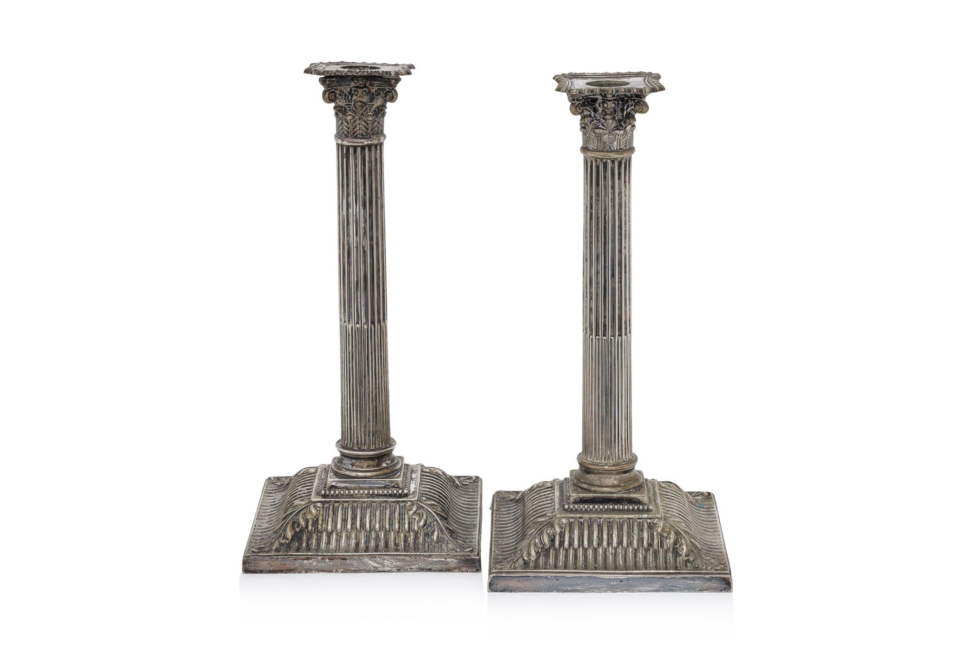 A PAIR OF ENGLISH SILVER PLATED CORINTHIAN COLUMN CANDLESTICKS