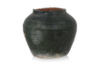 A LARGE GREEN GLAZED POTTERY JAR