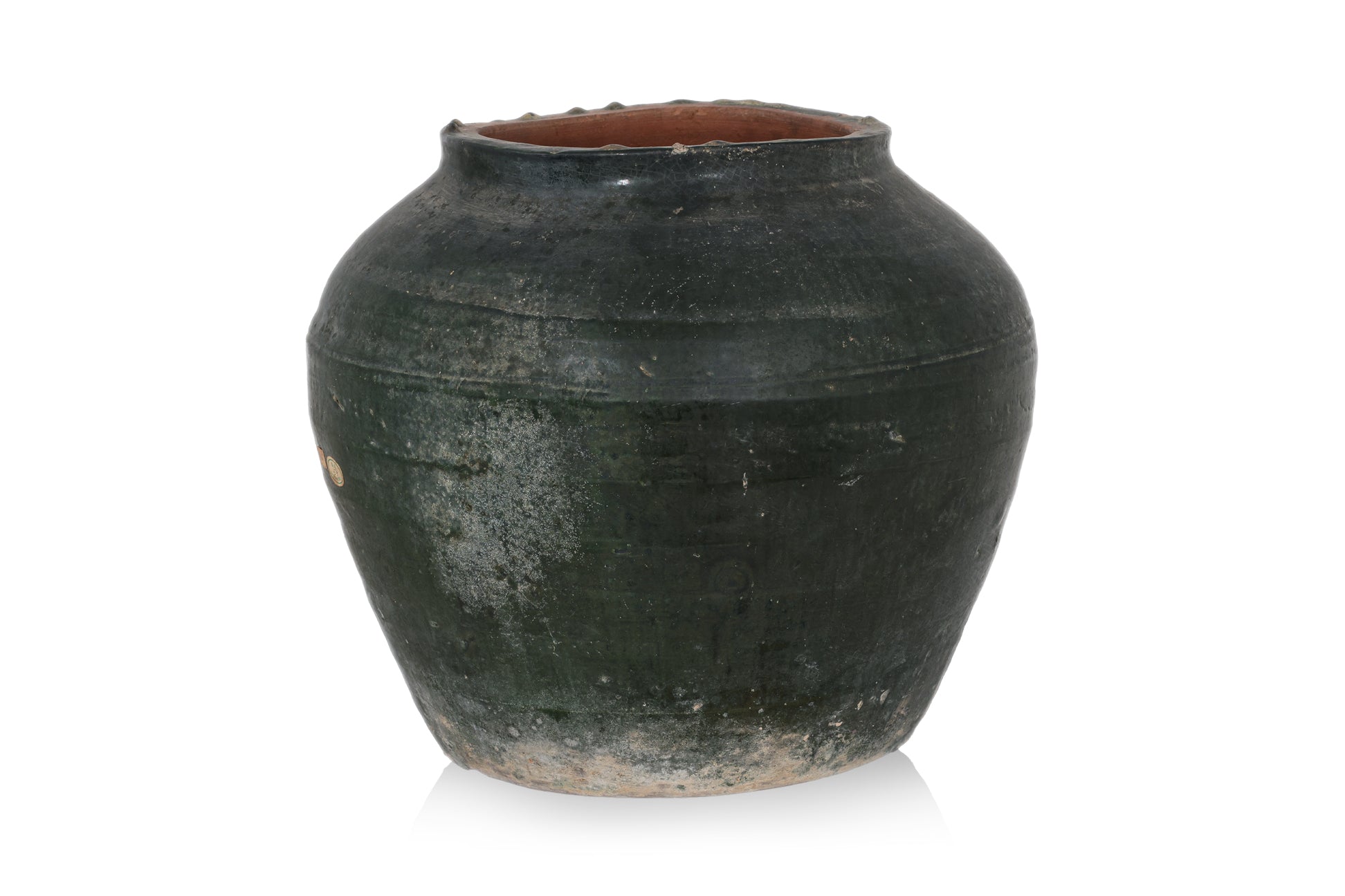 A LARGE GREEN GLAZED POTTERY JAR