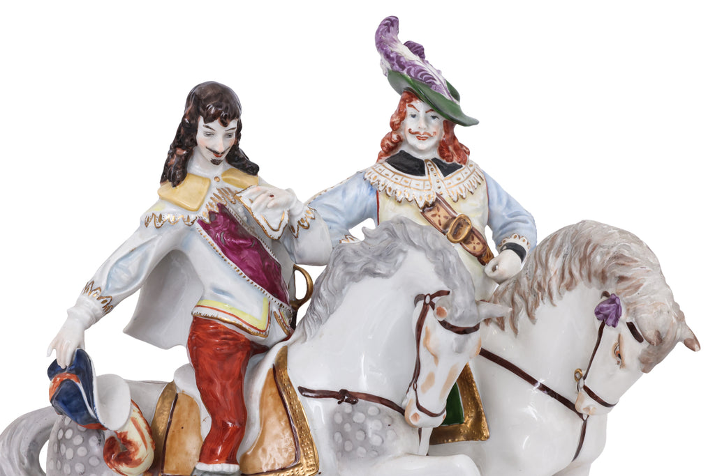 A SET OF FOUR WALLENDORF PORCELAIN FIGURES OF MUSKETEERS