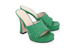 GUCCI - A PAIR OF GREEN STUDDED AND QUILTED HEELS
