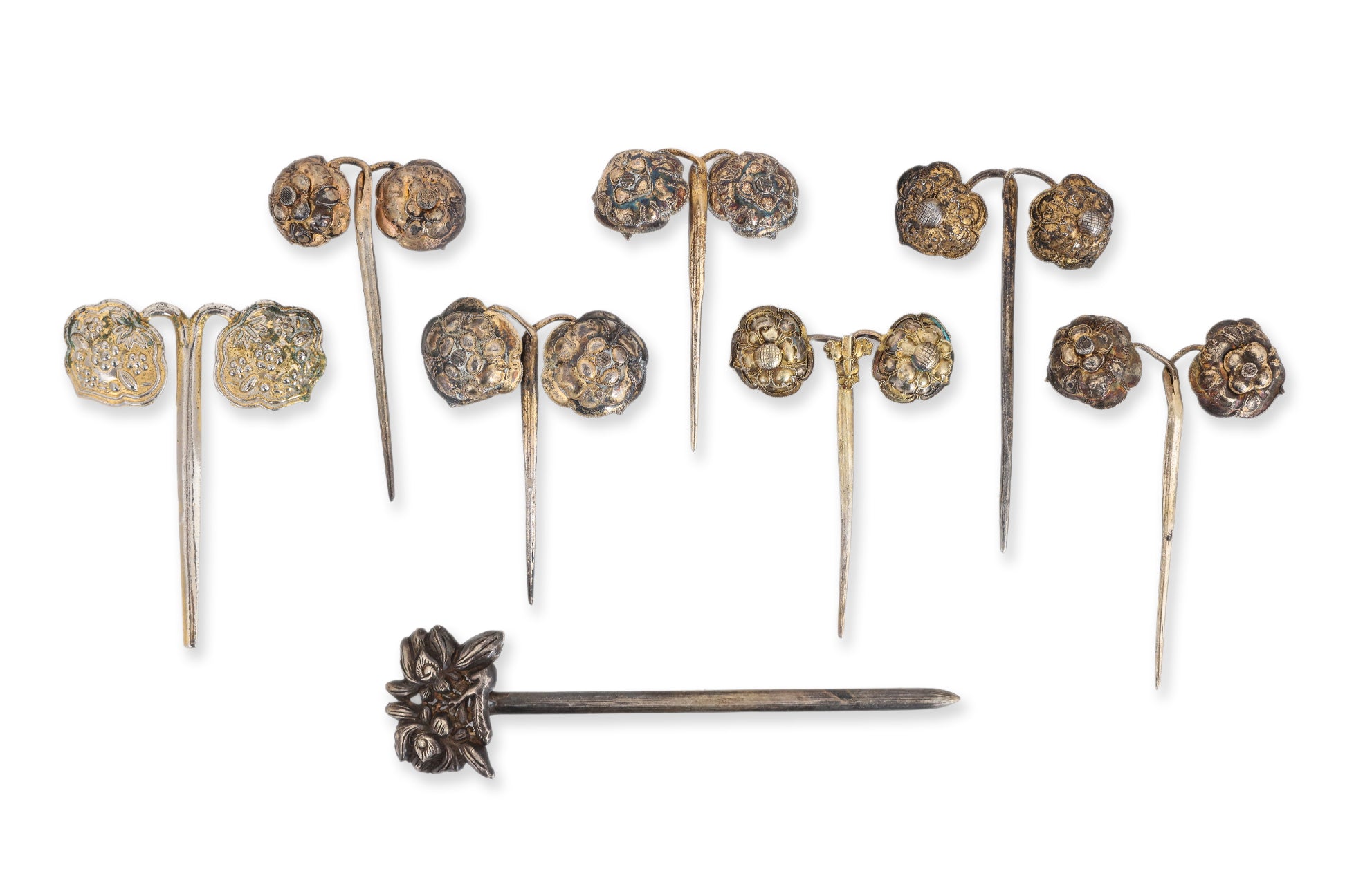 A GROUP OF EIGHT SILVER HAIR PINS