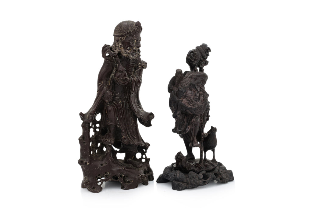 A SOAPSTONE AND A HARDWOOD CARVED FIGURE OF A MONK