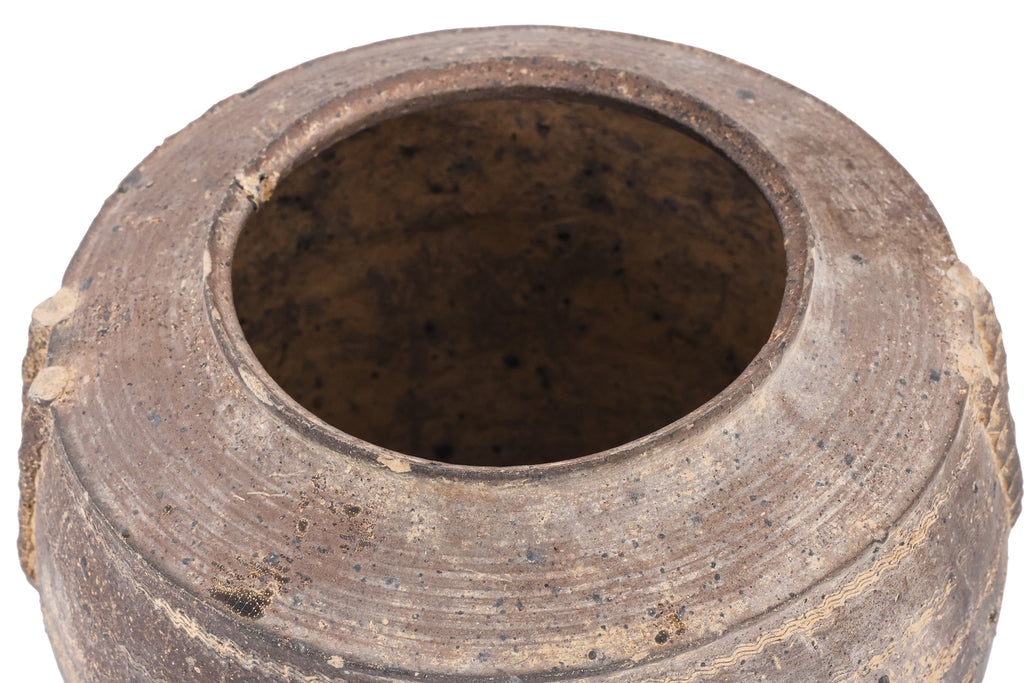 A DARK BROWN EARTHENWARE JAR