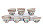 A SET OF 11 PORCELAIN TEA BOWLS