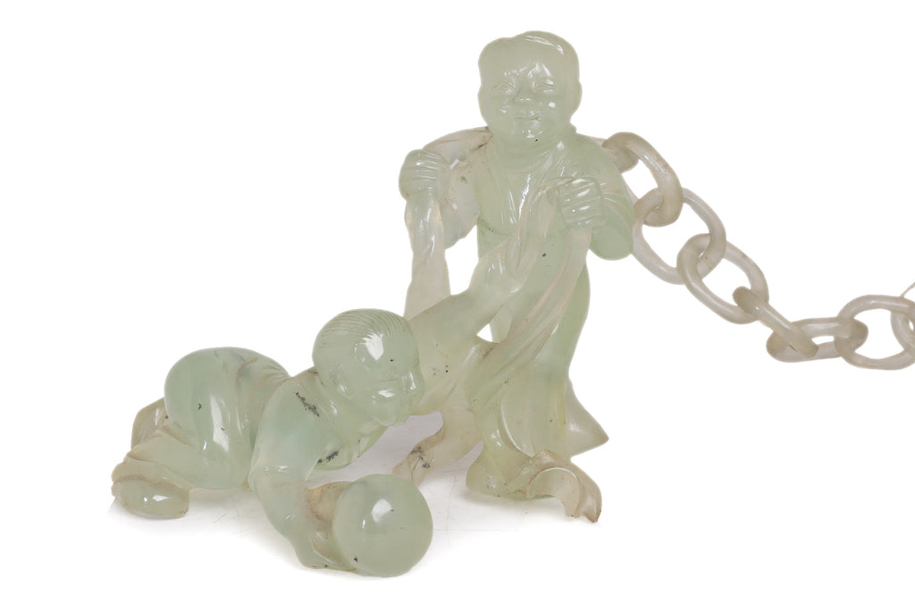 A SERPENTINE JADE DOUBLE GOURD VASE AND COVER