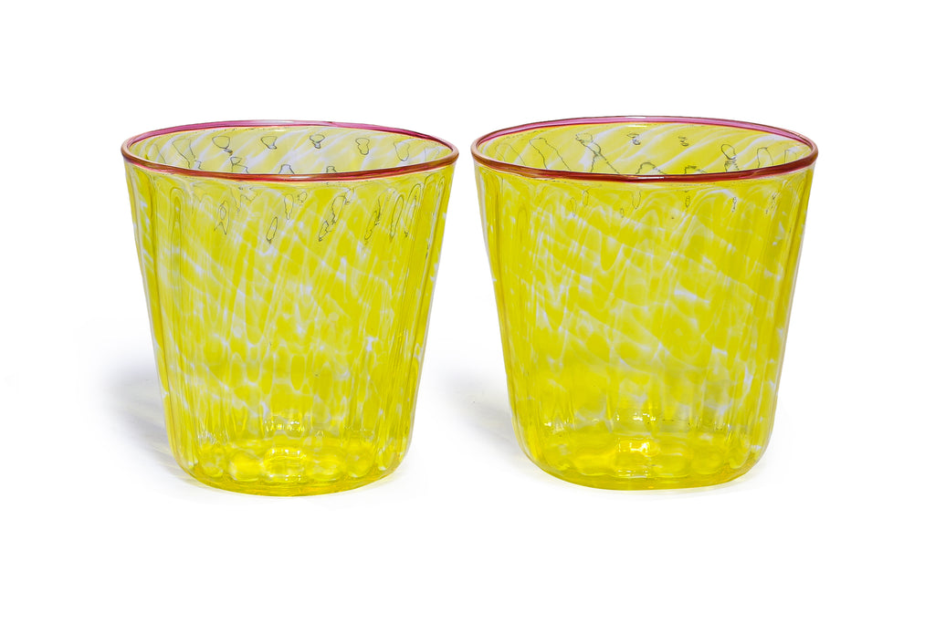 A GROUP OF SIX YELLOW GLASS TUMBLERS
