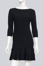 KHAITE - A BLACK RIBBED KNIT DRESS