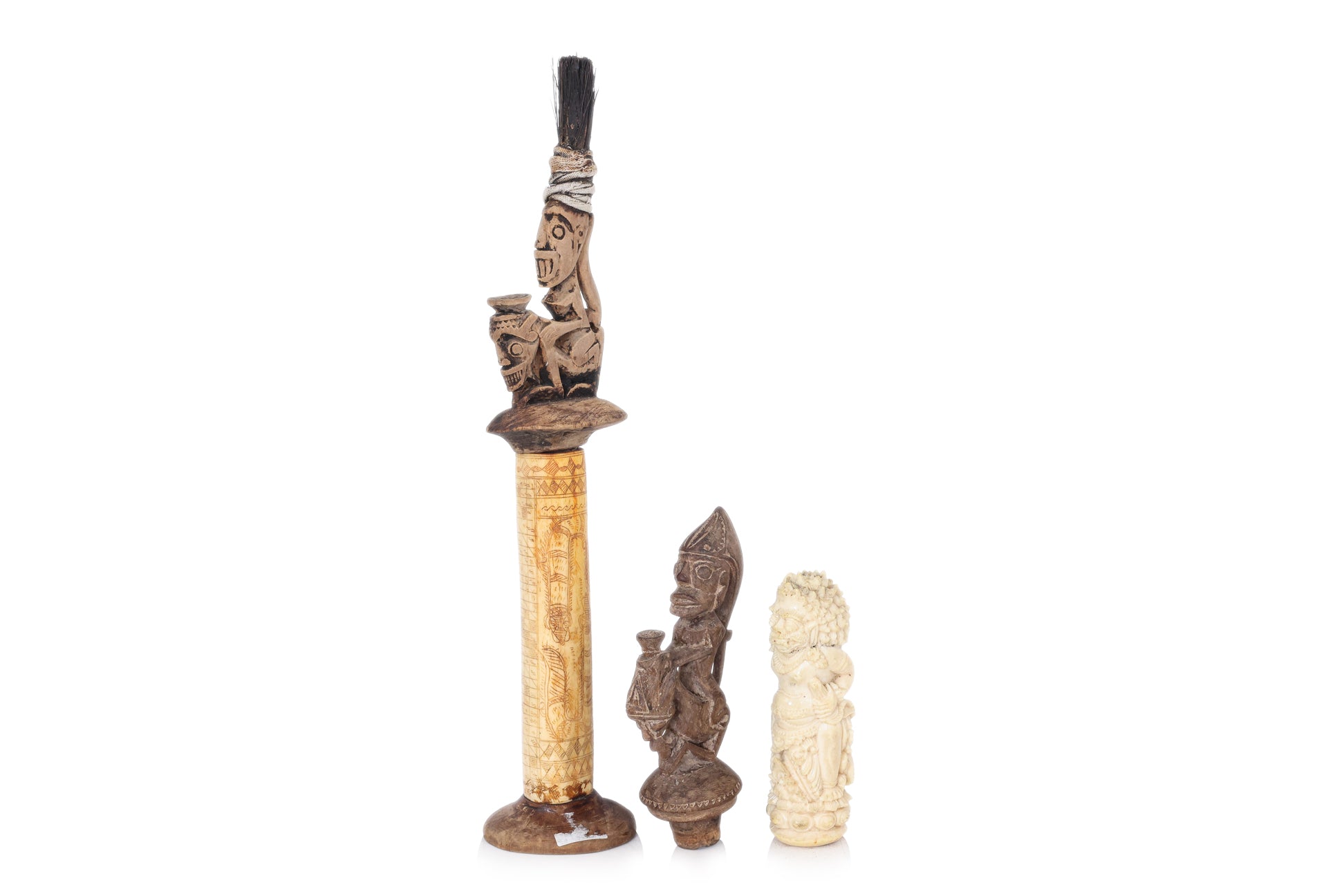 A GROUP OF SOUTHEAST ASIAN CARVED OBJECTS