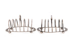 A PAIR OF ENGLISH STERLING SILVER TOAST RACKS