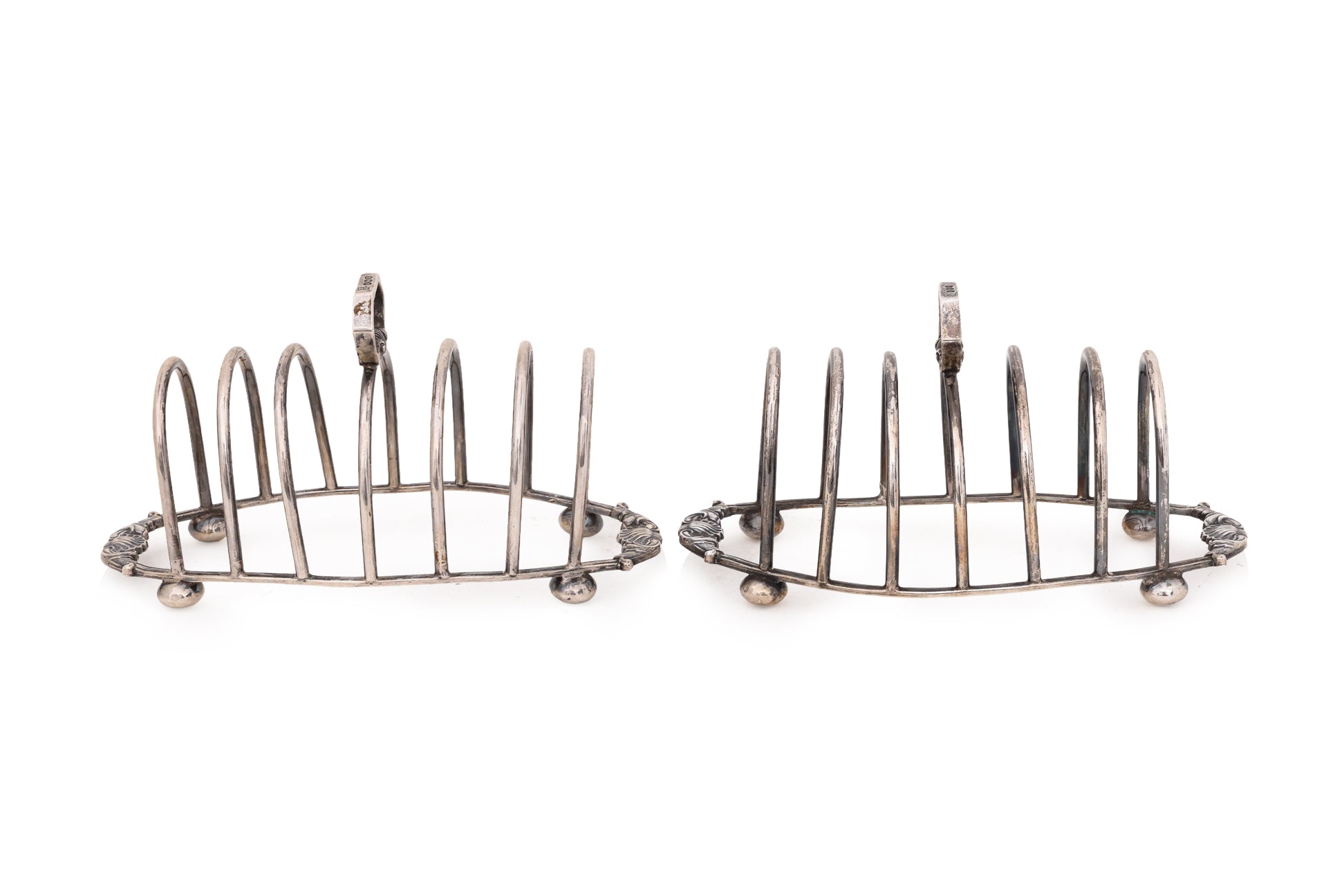 A PAIR OF ENGLISH STERLING SILVER TOAST RACKS