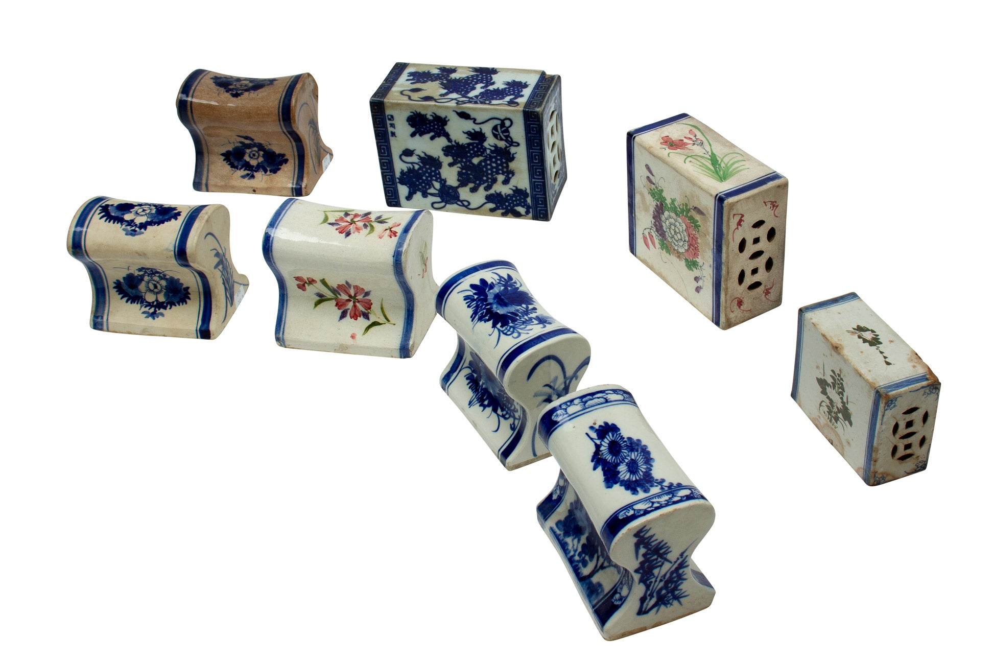 A GROUP OF EIGHT PORCELAIN PILLOWS