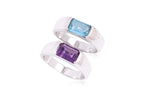 A BLUE TOPAZ RING TOGETHER WITH AN AMETHYST RING
