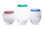 A GROUP OF THREE IVV GLASS JARS WITH COLOURED LIDS