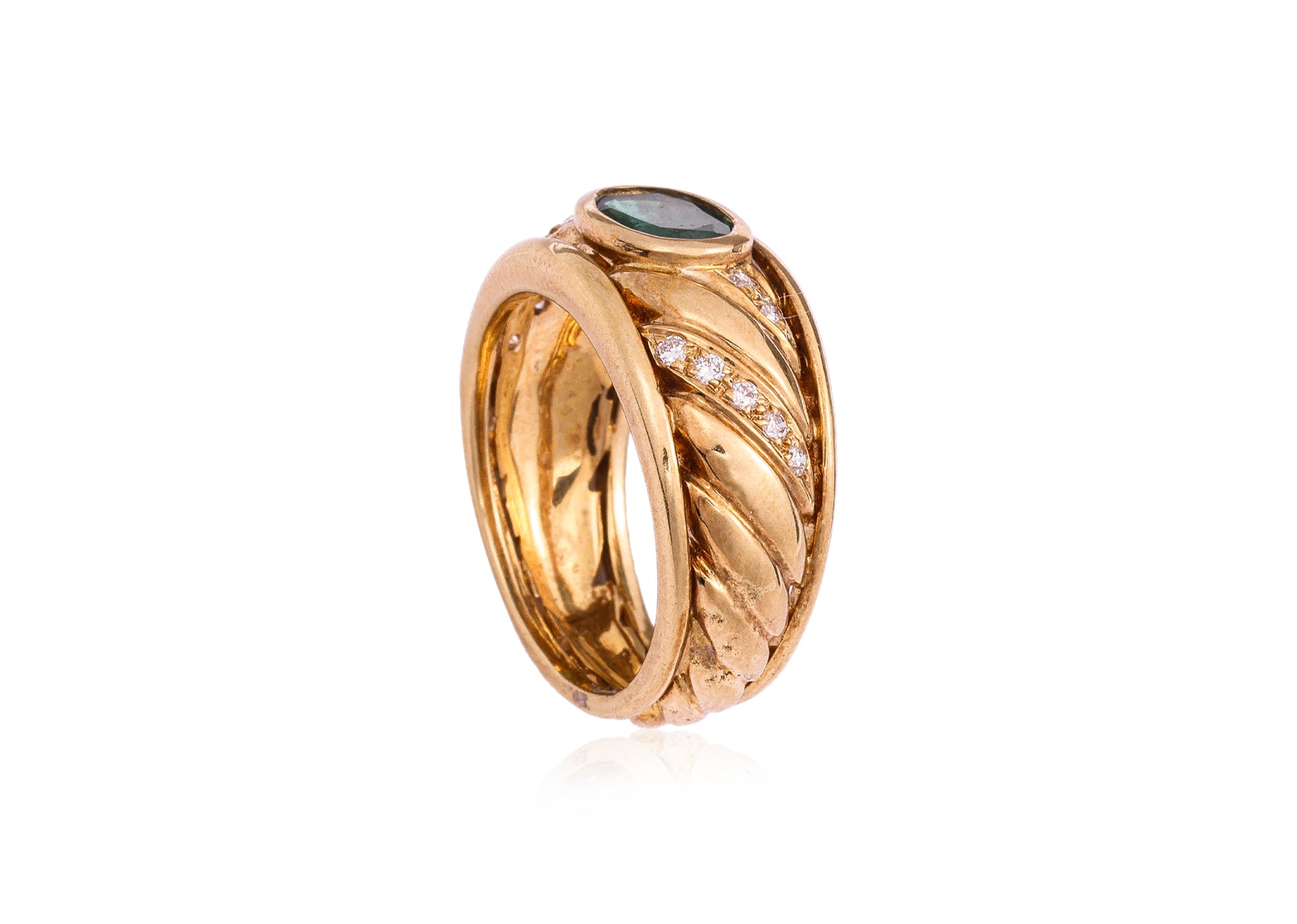 AN EMERALD AND DIAMOND RING