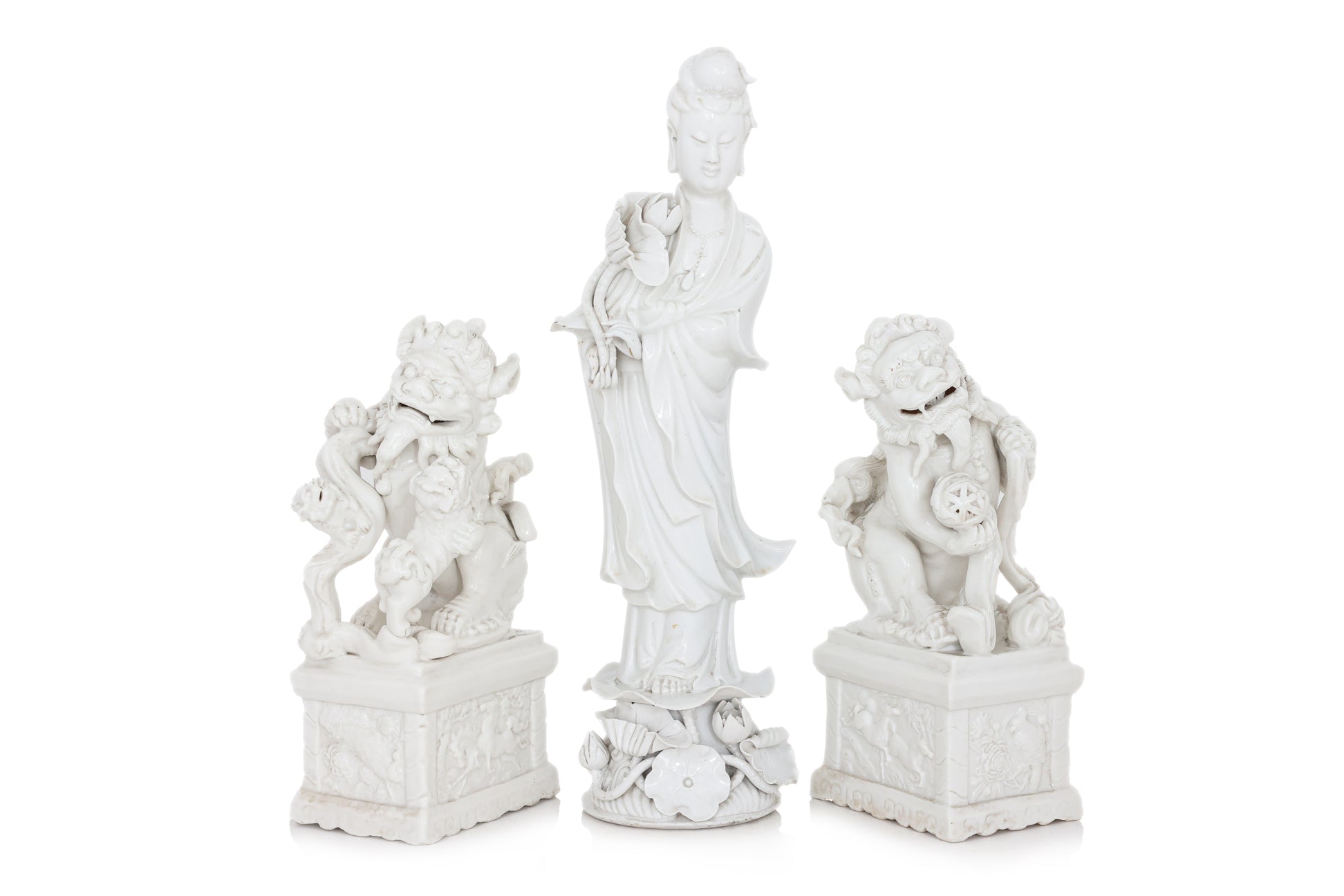 A GROUP OF THREE BLANC DE CHINE PORCELAIN FIGURES