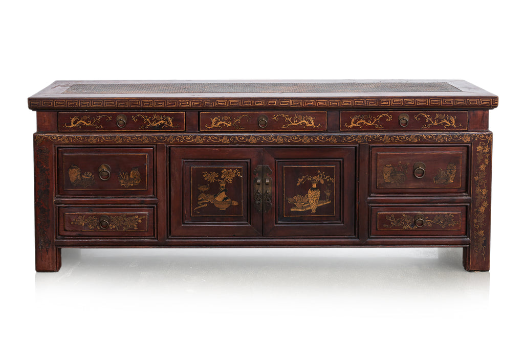 A CHINESE GILT DECORATED LOW CABINET