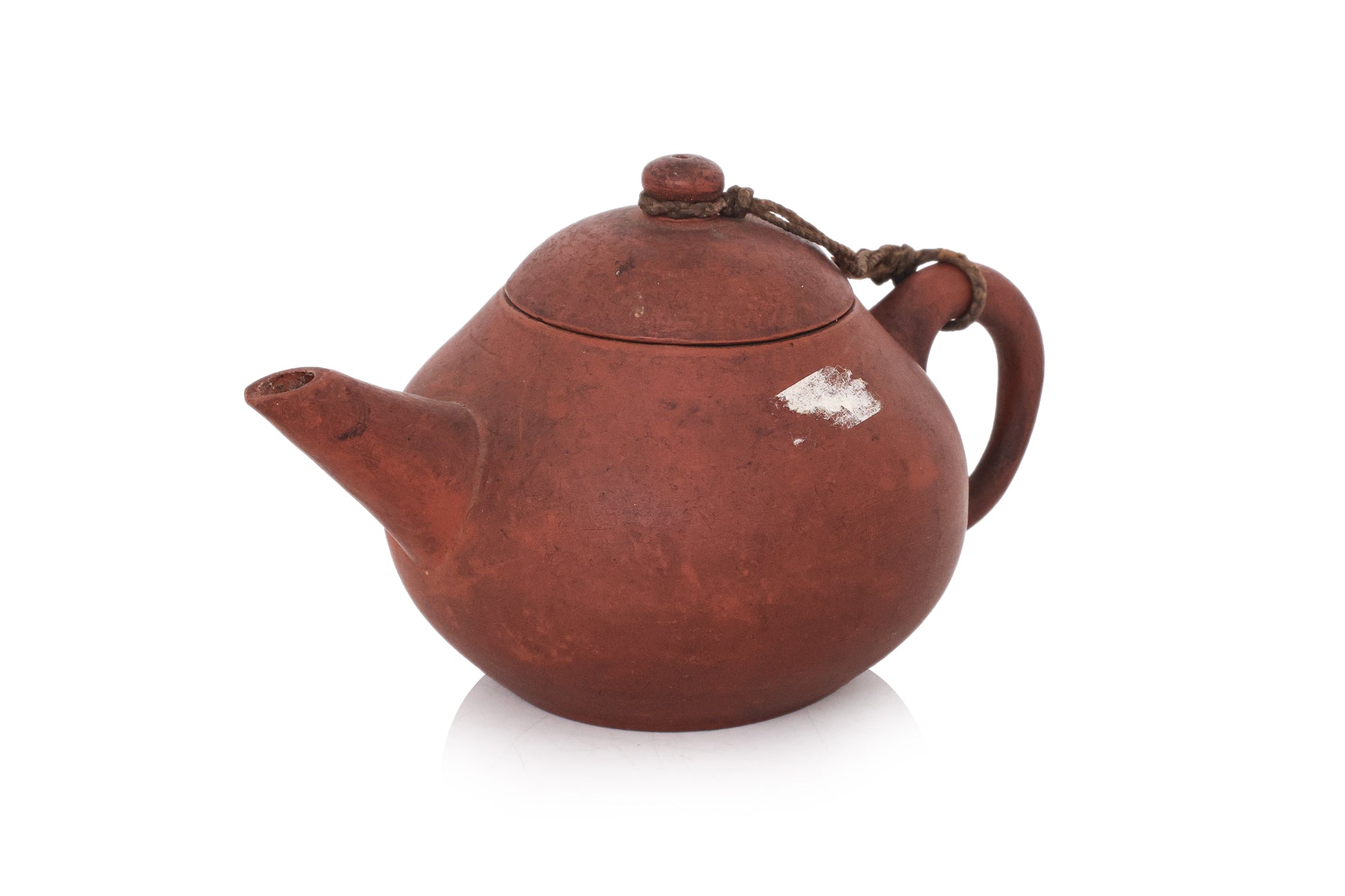A YIXING POTTERY TEAPOT AND COVER